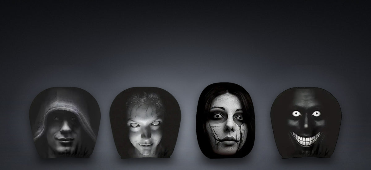 Four GhoulRide horror face headrest covers lined up in the fog